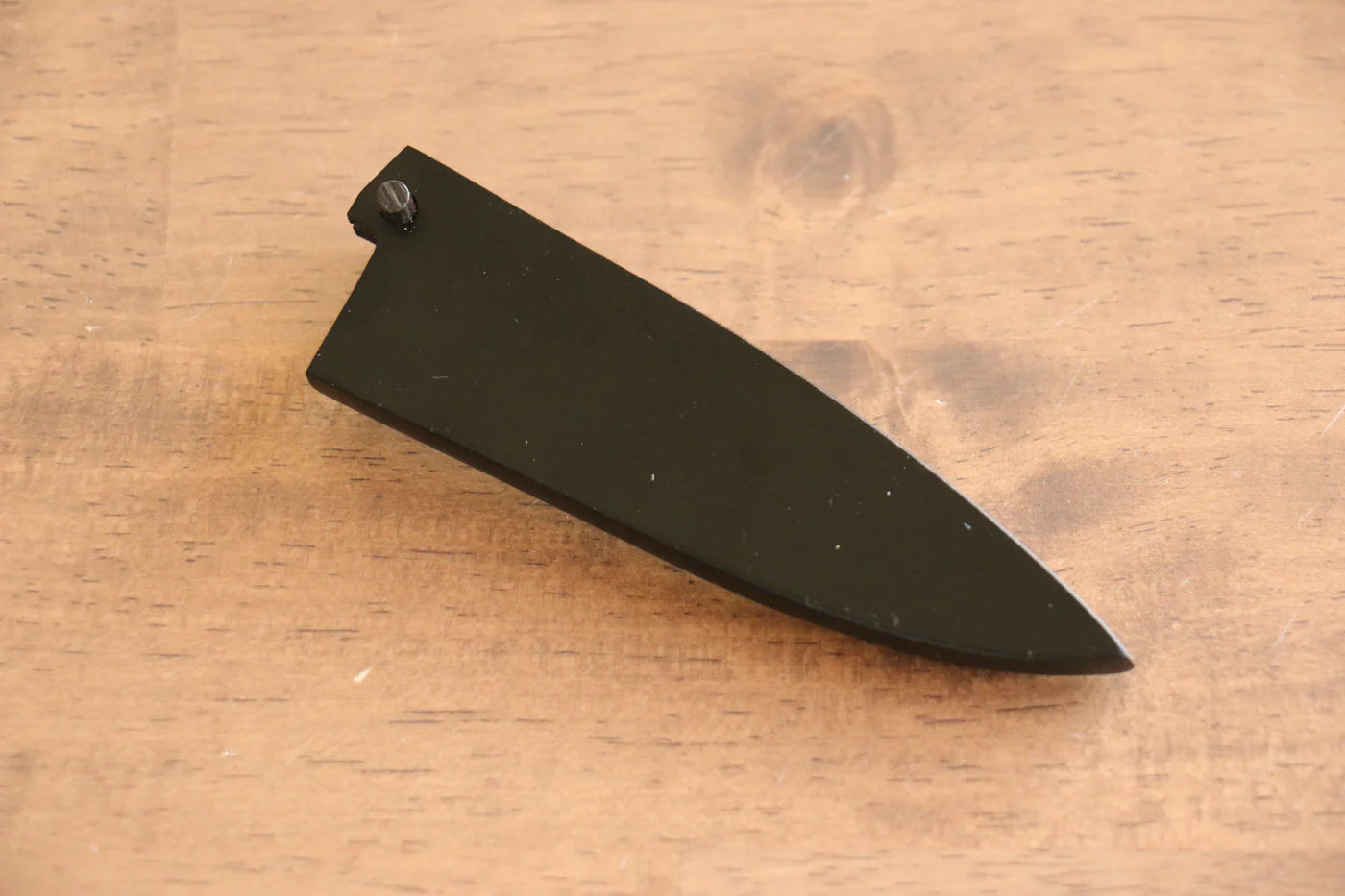 Messerscheide aus schwarzem Magnolienholz. Kleines Mehrzweck-Kleinmesser Kaneko, 80 mm laminierter Holzdübel
